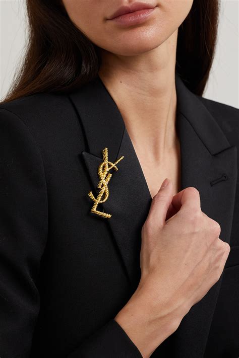 yves st laurent brooches